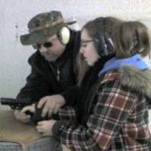 Alex, age 13 had never fired a gun before.  She passed the NRA Basic Pistol shooting test with her first 16 rounds!