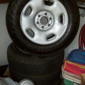 tires FOR SALE. 17 INCH TAKE OFF FORD LESS THAN 1500 MILES. STILL HAVE 97% TREAD LIFE. WHEELS, TIRES, HUBCABS.  375.00