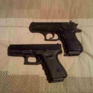 The wifey's guns. Glock 19 & Baby Desert Eagle